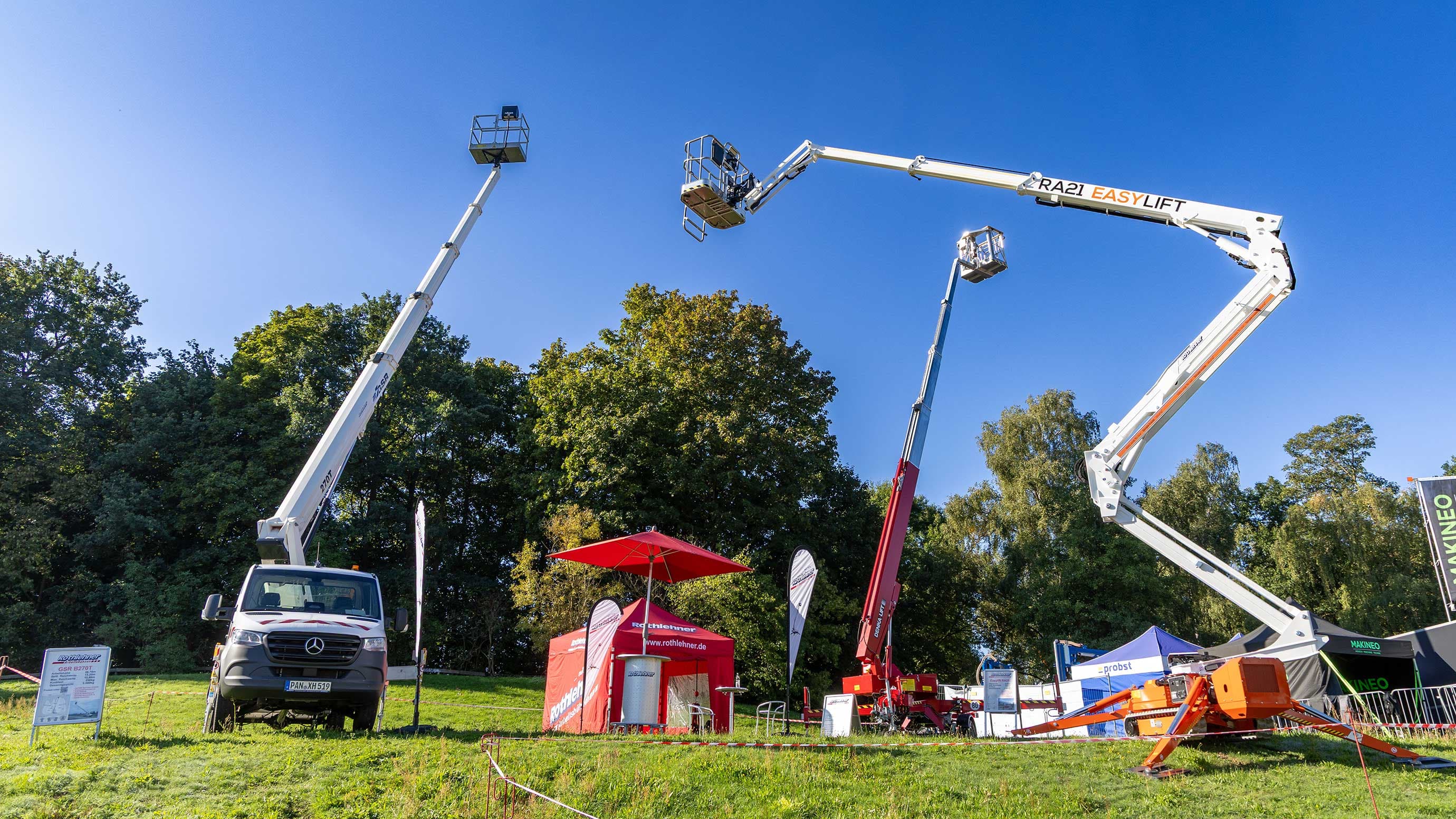 Several crane-mounted platforms at the demonstration areas of GaLaBau 2026